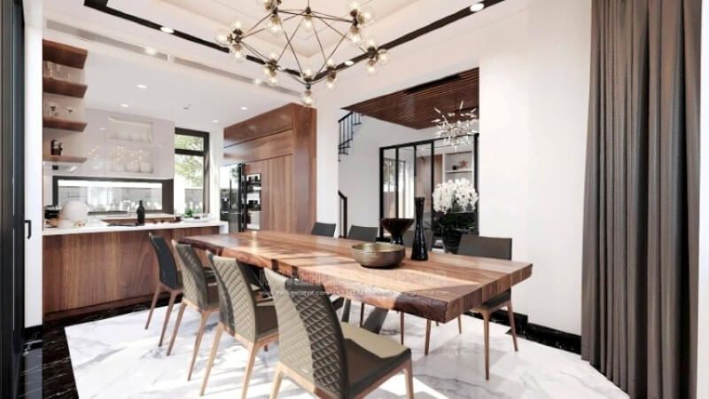 Ngoài điểm đặc biệt từ cách bố trí kệ trang trí, bàn đảo bằng đá nhân tạo LG màu trắng được thiết kế phô ra ngoài lại là điểm đáng chú ý, một mặt vẫn đảm bảo diện tích để chủ nhân có thể phô diễn món ăn thỏa mái, một mặt bạn lại có thể vừa nội trợ vừa có thể trông nom con học một cách dễ dàng.